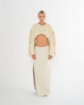 Jupe longue taille basse en jean écru de la marque de luxe made in France Raphael de Lacroix